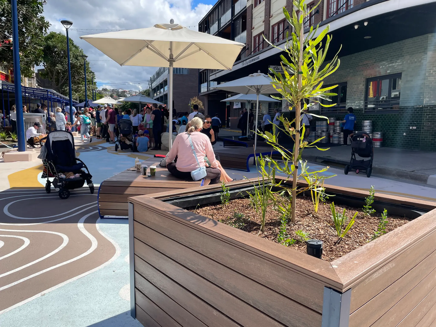 WaterUps planter installation at a busy coastal precinct