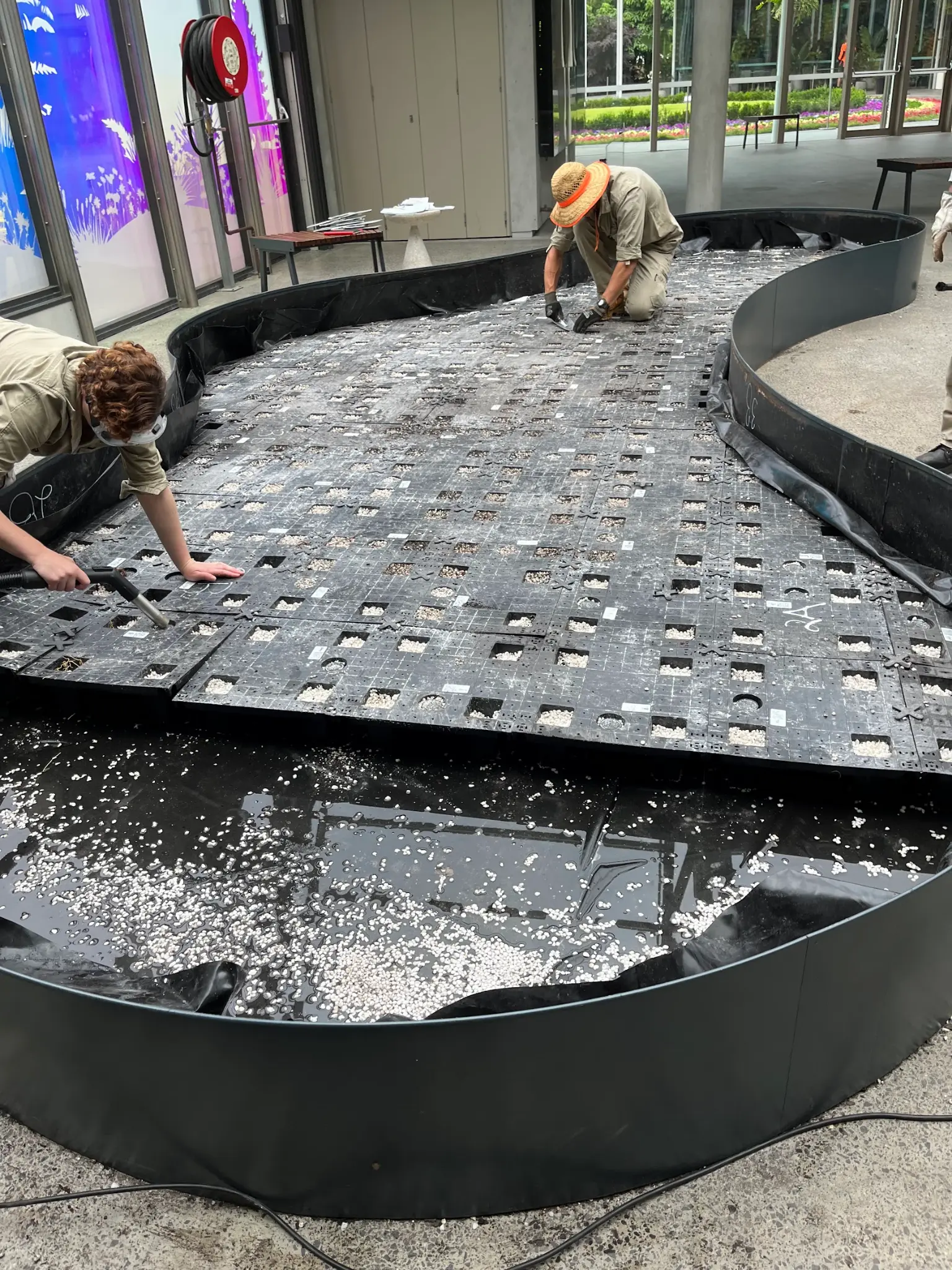 Installing 100+ CNC-cut wicking cells at The Calyx, Royal Botanic Garden Sydney