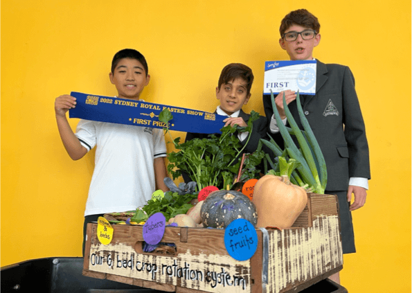 Trinity Grammar Schools boys with show winning vegetables